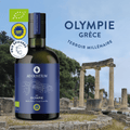 Bouteille d'huile d'olive vierge extra BIO IGP Olympie Ad Olivetum devant les ruines antiques d'Olympie, Grèce — Médaille Argent Prix Épicures 2026